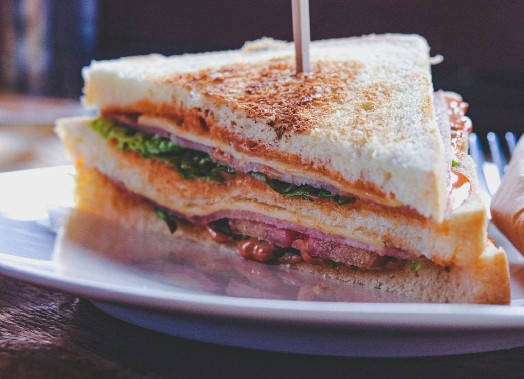 A BLT sandwich on a plate.